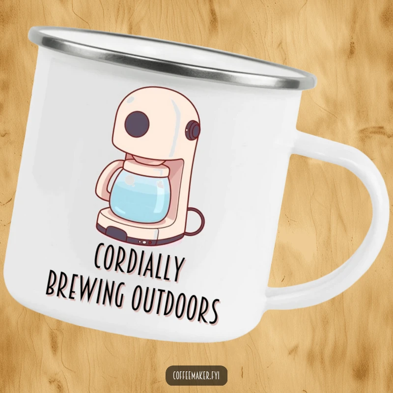 Funny camping mug showing a coffee maker wiggling its power cord like a tail, perfect for enjoying warm drinks outdoors.